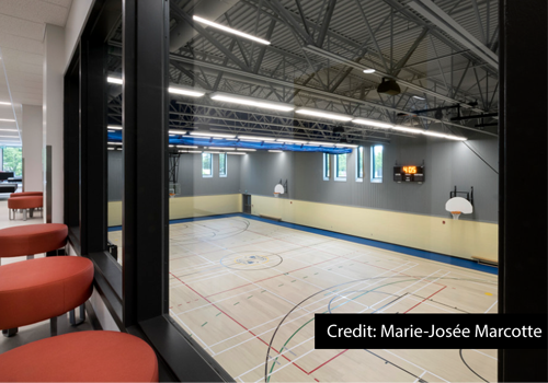 A gymnasium viewed from an upper-level window.